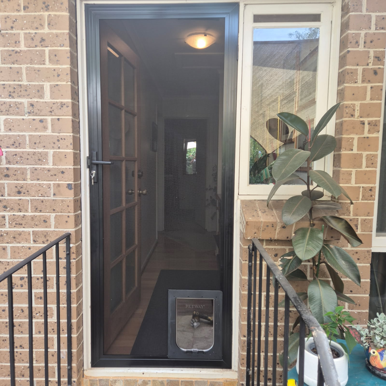 Security door with pet door installed