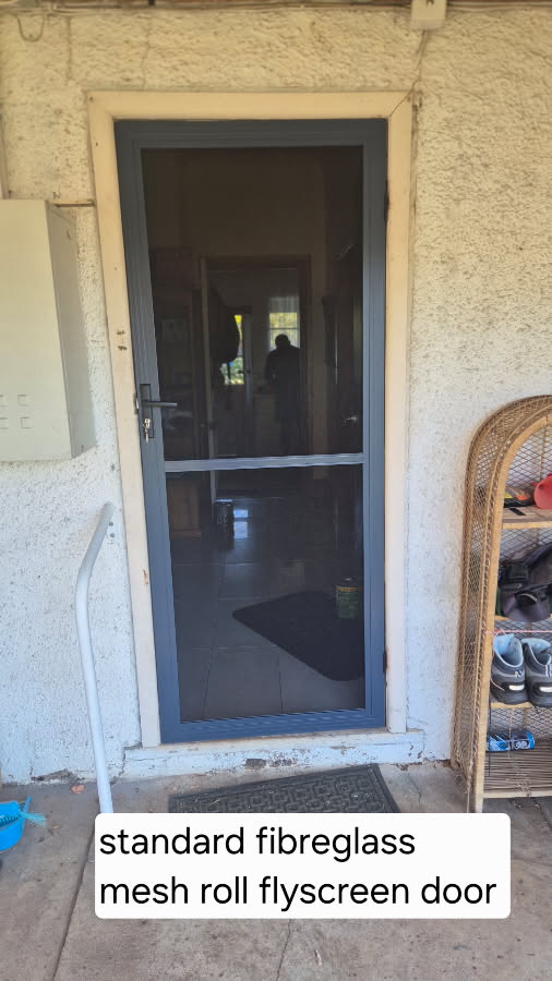 Sliding security door with doggy door on deck